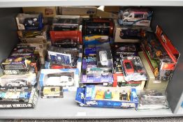 A shelf of modern diecasts, including Saico, Maisto, Funtastic and similar all boxed approx 70+