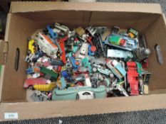 A box of playworn diecast and tin plate including Corgi, Lesnry, Matchbox etc
