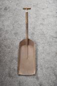 A British Railway Coal Iron Shovel having wooden handle, stamped E & W Lucas BR (W), possibly