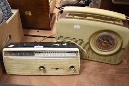A mid century Bush radio and a Sanyo 6 transistor cordless radio.