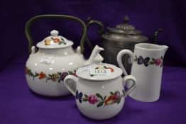 A Porcelain De Paris part tea set with a silver plated tea pot.