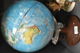 A vintage illuminated globe. Having slight damage.