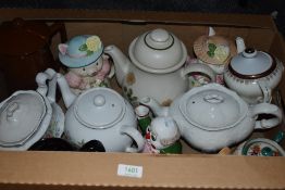 An assortment of teapots including novelty.