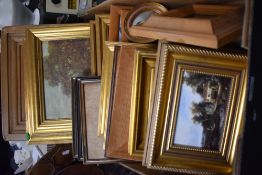 A large collection of small pictures and frames.