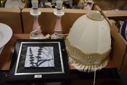 A contemporary framed Melissa Pluch botanical print, light shades, and two modern pink table lamp
