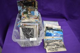 A collection of 20th century and later postcards including some earlier black and white examples.