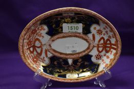 An antique meat dish marked Anstice Horton and Rose. Decorated in an Imari design.