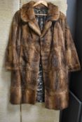 A mid century full length fur coat.