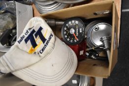 A collection of parts and spares etc, including speedometer, SN/3233/00 and oil temperature gauge.