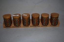 Six Hornsea pottery 'Bronte' spice jars, in possibly associated wooden rack.