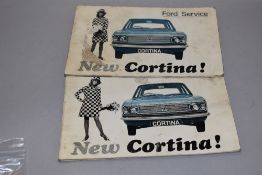 A Ford Cortina service book and an owner manual