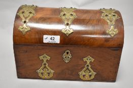 A Victorian dome topped office desk top tidy and stationary and letter rack, having a walnut case