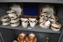 A collection of late 19th/early 20th century 'Empress' china, graded plates, jugs, cups and