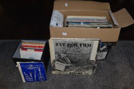 A selection of vinyl albums and singles from the Beach Boys to the Beatles and comedy including