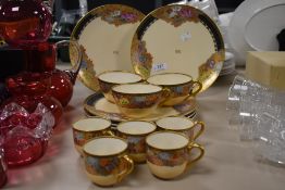 A 20th century Japanese Satsuma ware part tea service having milliefiori decoration.