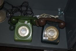 Two vintage plastic 1960s/70s Rotary telephones.