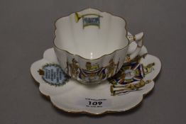 A collectable cup and saucer ' Colonies supporters of the Empire volunteers to swag below