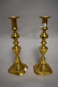 A pair of Victorian brass candlesticks.