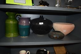 Five items of pottery, including large modern grey vase and green jug.
