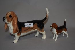 Two Beswick dog studies including Bassett Hound and Blood Hound.