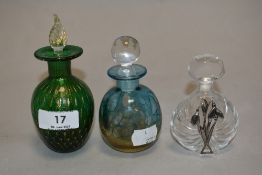 Three 20th century art glass perfume bottles, including green glass with gold flecks and clear
