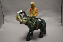 A 1930s Art Deco chalkware elephant and rider.