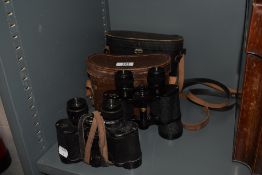 A pair of vintage Kershaw binoculars and a pair of unbranded Japanese made binoculars, both with
