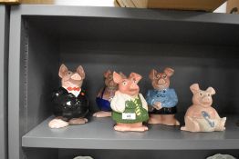 Five collectable Wade Natwest piggy banks.