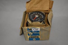 A vintage speedometer, SN/3233/00.