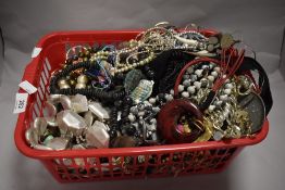 A box full of mixed costume jewellery, perfect for resale.