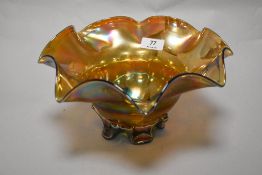 An Iridescent carnival glass bowl.