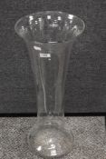 A modern large floor standing hand blown glass vase of fluted bell form 60cm tall.
