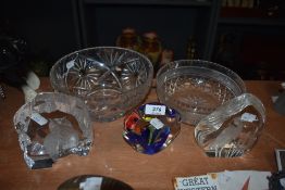 Three glass paperweights and two glass bowls
