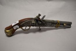 A replica flintlock pistol.