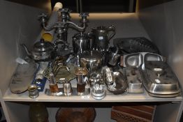 A collection of vintage and retro flat ware, including cruets, serving dishes, teapots, candlestick,