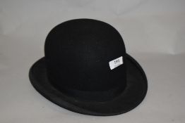A vintage bowler hat, having local label for Kendal.