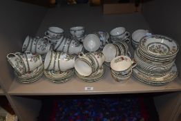 A large collection of Johnson Bros 'Indian Tree' cups, saucers, plates and bowls.