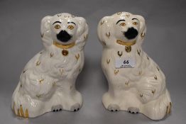 A pair of Staffordshire style dogs, marked Beswick, England 1378-5 to underside.
