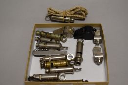 A collection of vintage whistles and similar, to include; the Acme Thunderer, the Metropolitan,