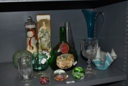 An assorted lot of glass, including Millefiori paperweights, vintage wine bottle, 1960s handkerchief
