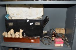 A leather doctors case, containing an assortment of medical equipment and bottles, included are