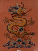 An attractive mid to late 20th century polychrome embroidery, depicting a five-clawed Chinese