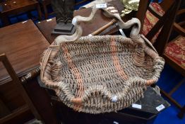 An interesting basket having briar wood or similar handle