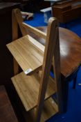 A modern beech effect folding pan rack or similar