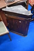 A 19th Century oak corner wall cupboard of small proportions, height approx. 71cm