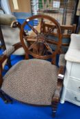 A reproduction carver chair
