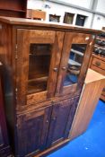 A modern stained frame cocktail or similar cabinet