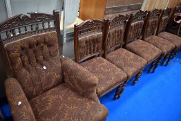 A Victorian salon suite comprising two arm chairs and six dining chairs, all having moquette