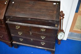 An 18th Century dark oak bureau