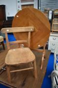A vintage oak and ply occasional table and a childs solid seat chair